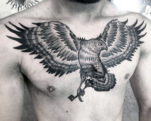 Black Ink Guys Falcon Flying With Key Chest Tattoo Designs