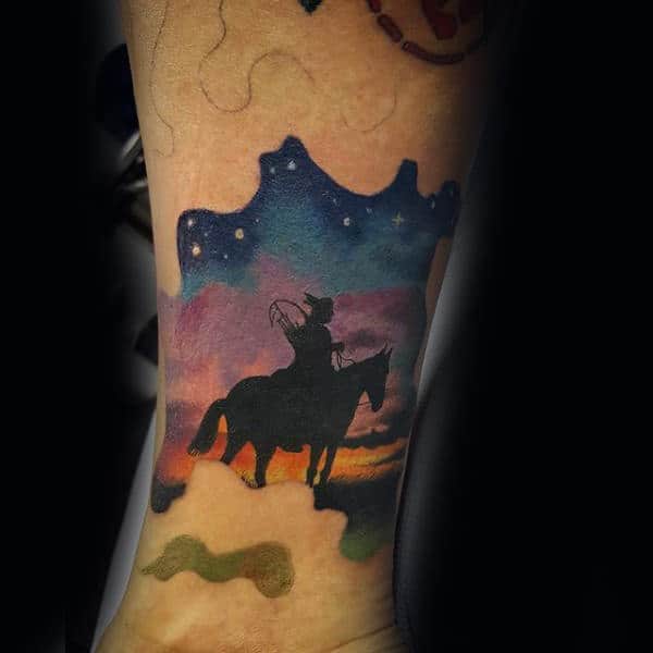 Black Ink Native American On Horse With Watercolor Sky Background Mens Leg Tattoo