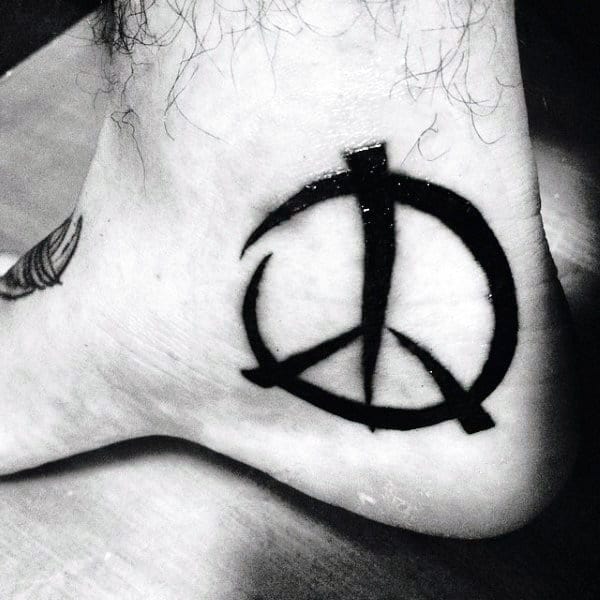 Black Ink Peace Sign Mens Foot Tattoos