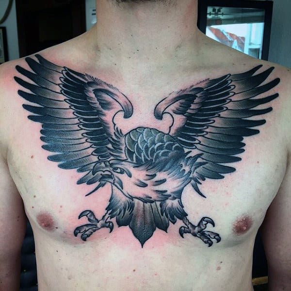 Black Ink Shaded Male Traditional Tattoo Design On Upper Chest