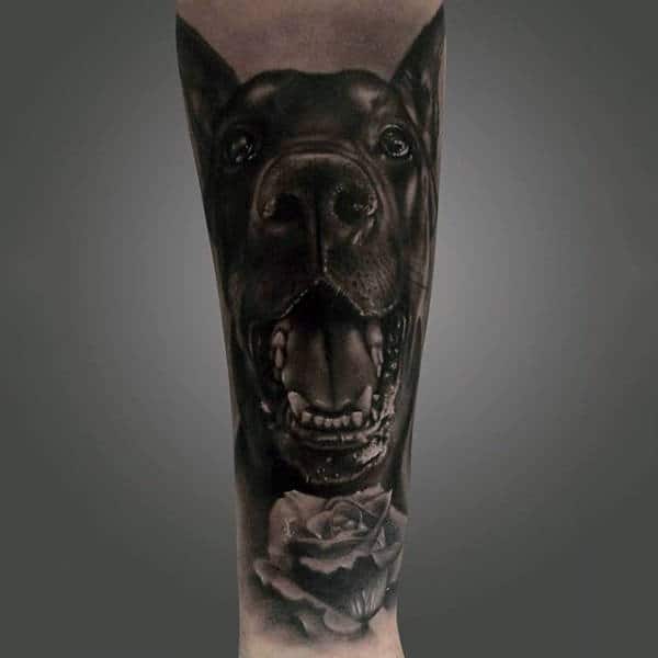Black Ink Shaded Mens Half Sleeve Dog Tattoo Design With Rose Flower