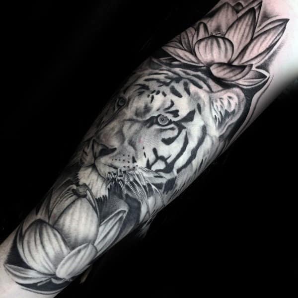 black-ink-shaded-tiger-with-lotus-flowers-mens-forearm-tattoos