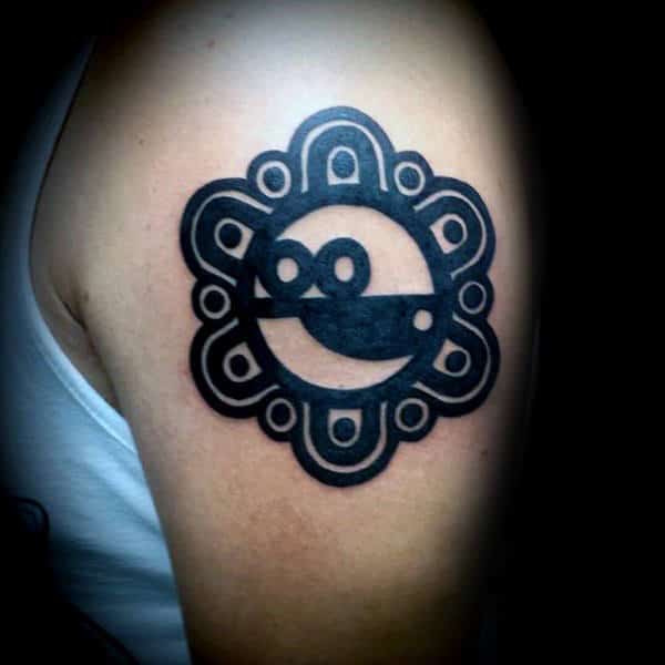 Black Ink Sun And Moon Taino Mens Tattoo On Upper Arm