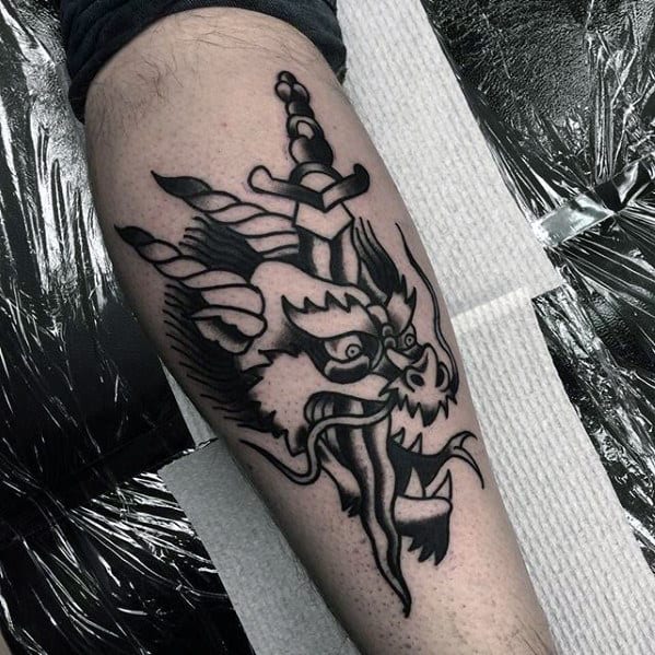 Black Ink Traditional Dragon Tattoo For Men On Leg