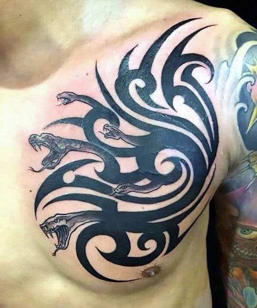 Black Ink Traditional Tribal Snake Male Chest Tattoo