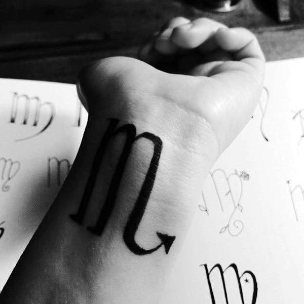 Black Ink Virgo Symbol Tattoo On Wrist For Men