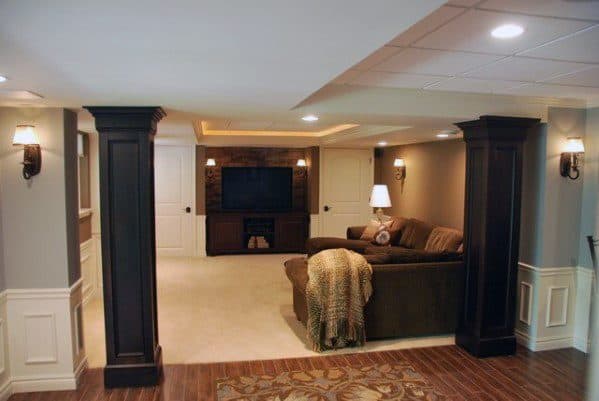 black painted living room basement poles