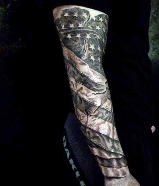 Black Sleeve Man With American Flags Tattoos