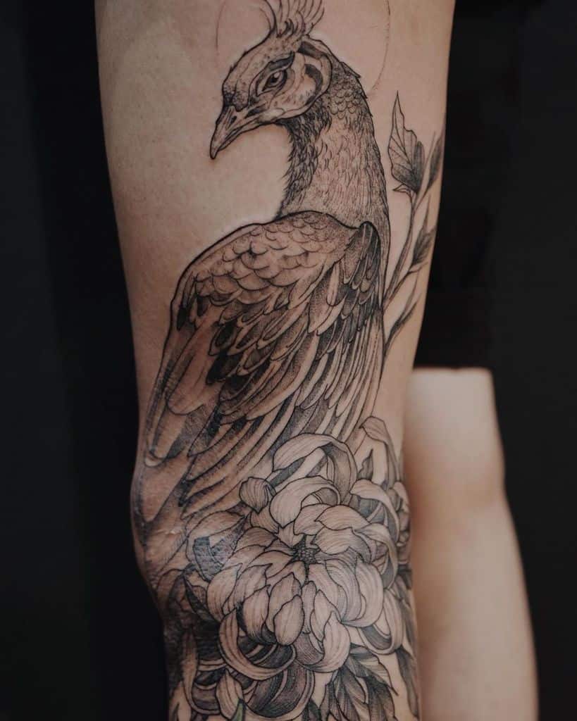 Premium AI Image | A black and white peacock tattoo.