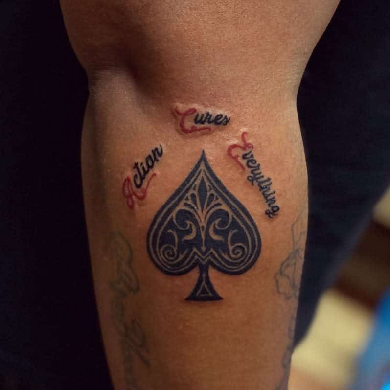 king of spades finger tattoo