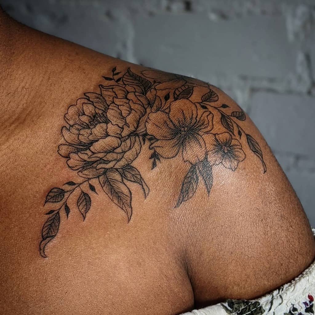 blackwork flower shoulder tattoo inksplinters