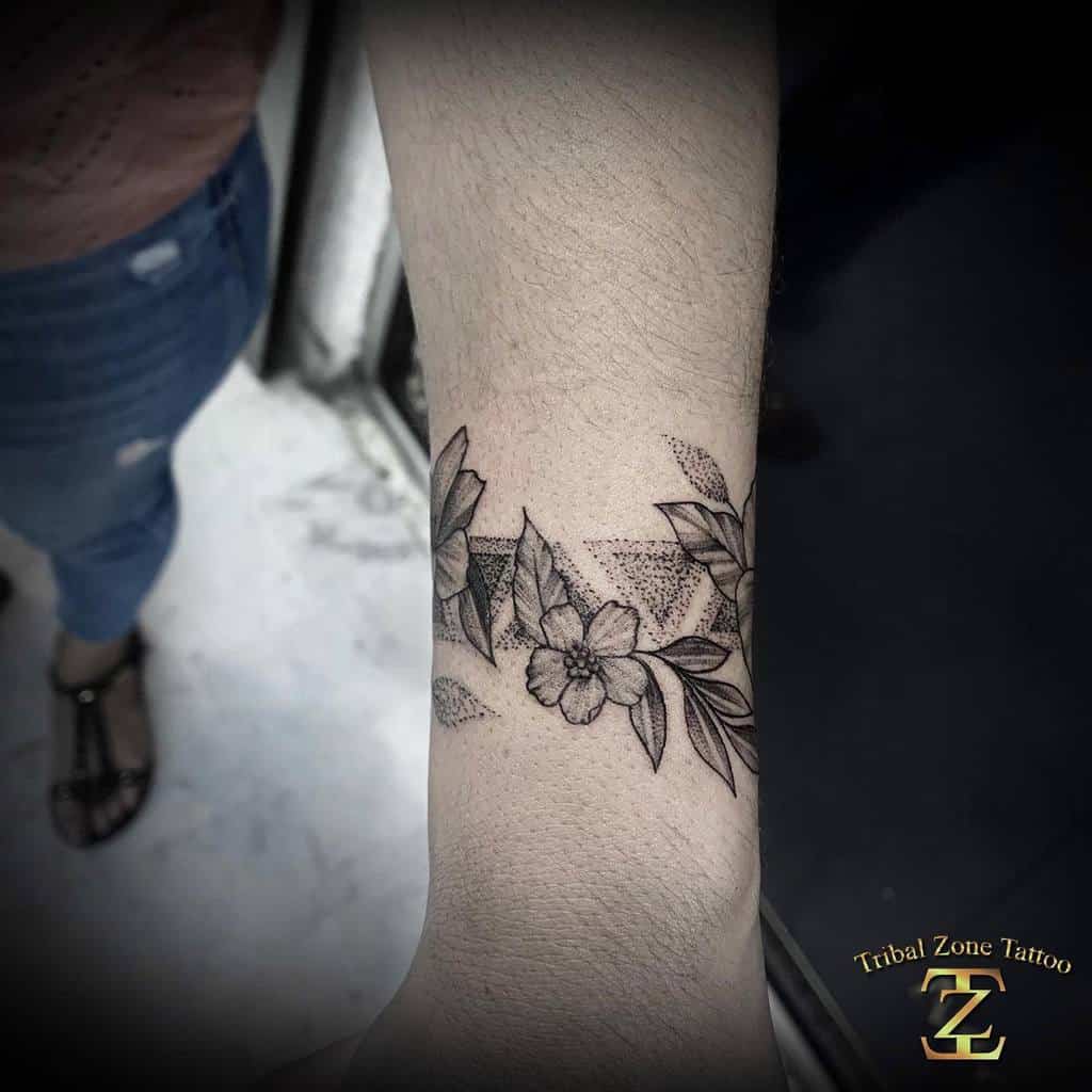 blackwork flower wrist tattoo tribalzonetattoo