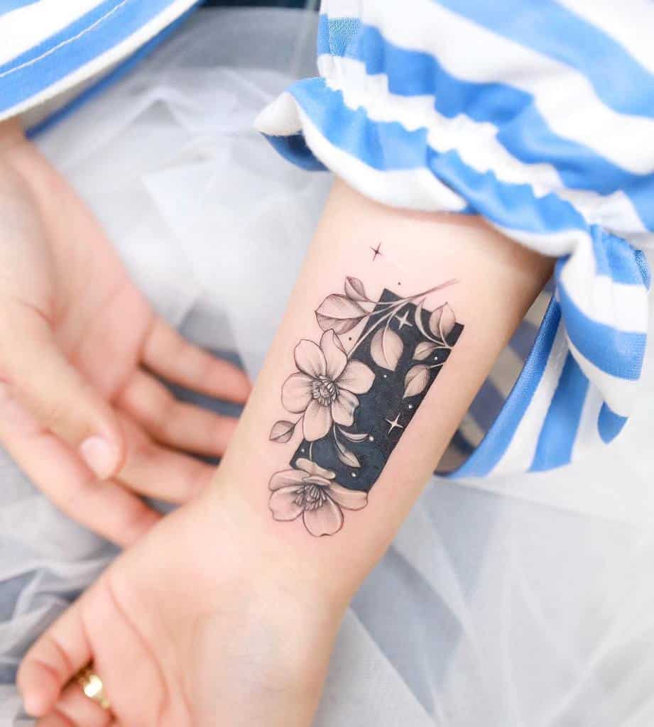 blackwork flower wrist tattoo xiso_ink