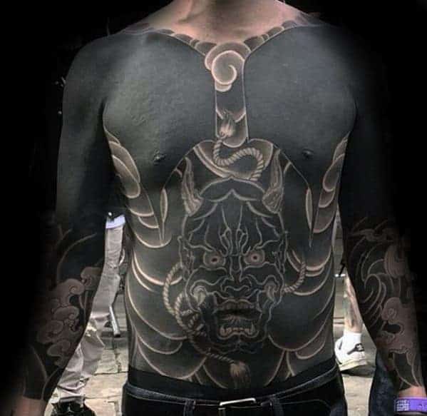 blackwork-guys-demon-mask-japanese-mens-chest-tattoos