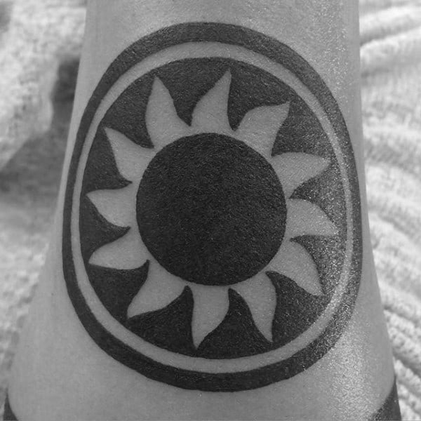 Blackwork Negative Space Tribal Sun Mens Foot Tattoo