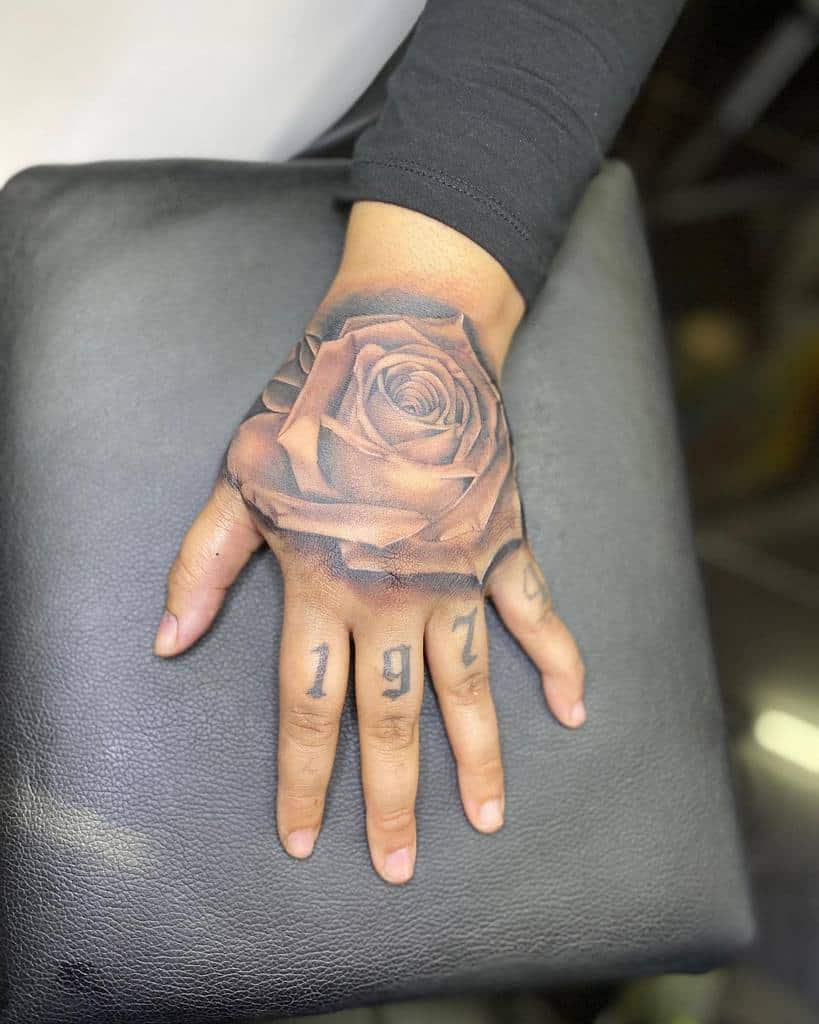 blackwork rose hand tattoos popz_ink