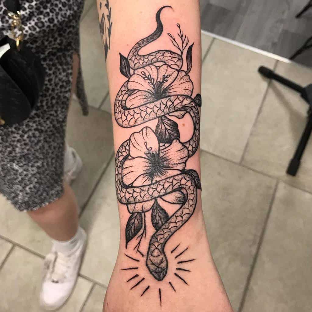 blackwork snake arm tattoo mongreldave