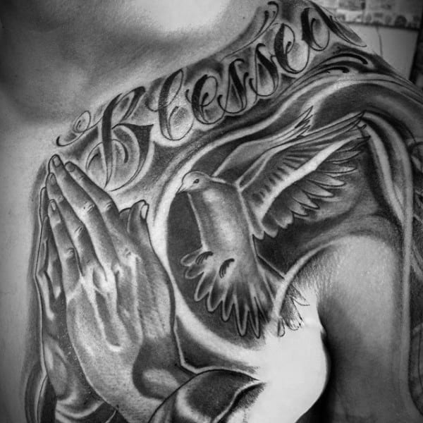 Blessed Tattos For Men On Chest With Praying Hands And Flying Dove