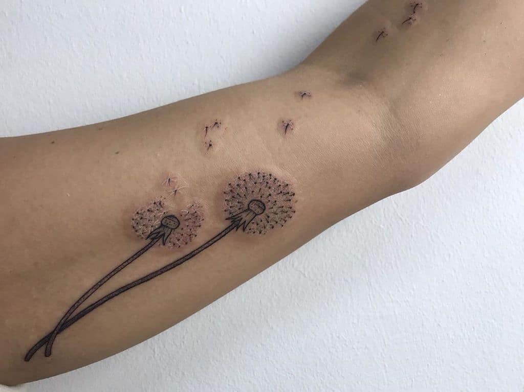 blow ball dandelion tattoo