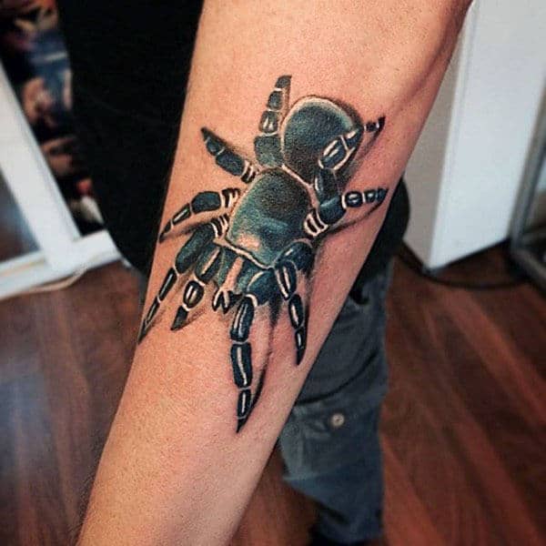 Blue And Black Ink Tarantula Male Outer Forearm Tattoos