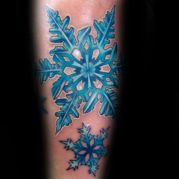 Blue And White Ink Snowflake Inner Forearm Tattoo On Gentleman