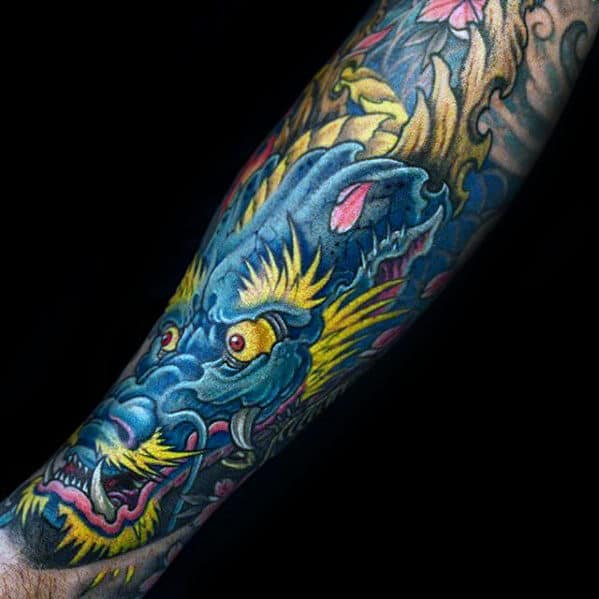 Blue And Yellow Dragon Forearm Tattoo On Gentleman