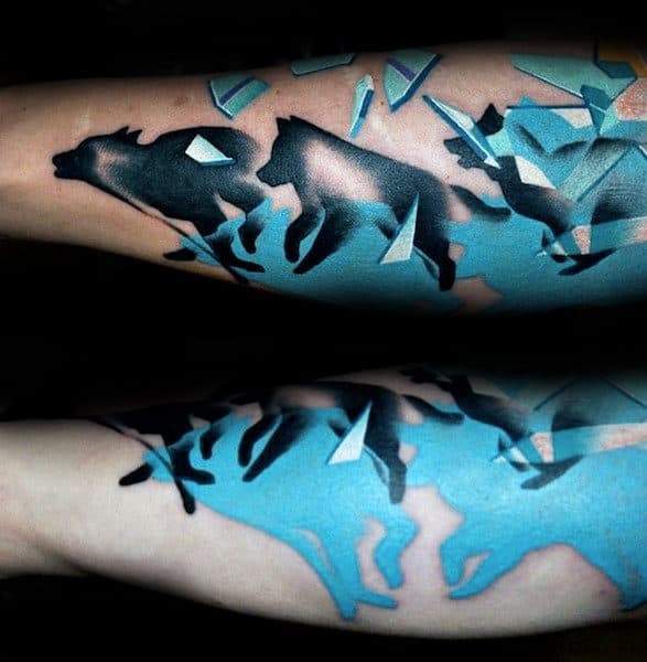 blue-ink-mens-abstract-running-wolves-forearm-tattoo