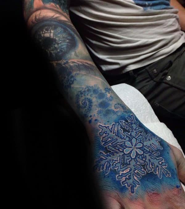 Blue Ink Snowflake Hand Tattoos For Guys