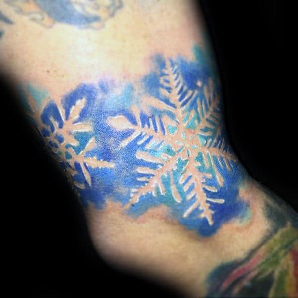 Blue Ink Watercolor Snowflake Negative Space Mens Arm Tattoos