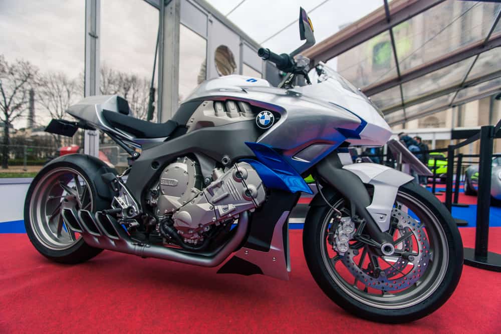 bmw concept 6 electric motorcycle parked on red carpet in paris