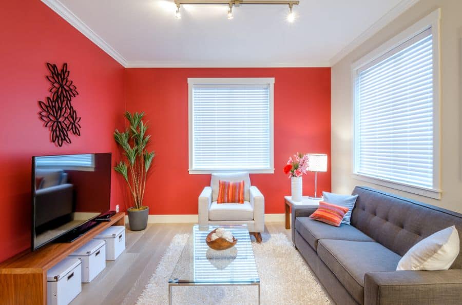 modern living room with red accetn walls