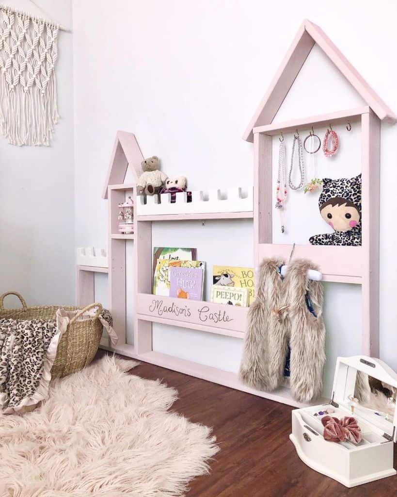 young girl pink wall bookcase