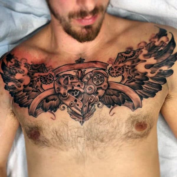 Breathtaking Feather Pattern Tattoo For Men On Chest