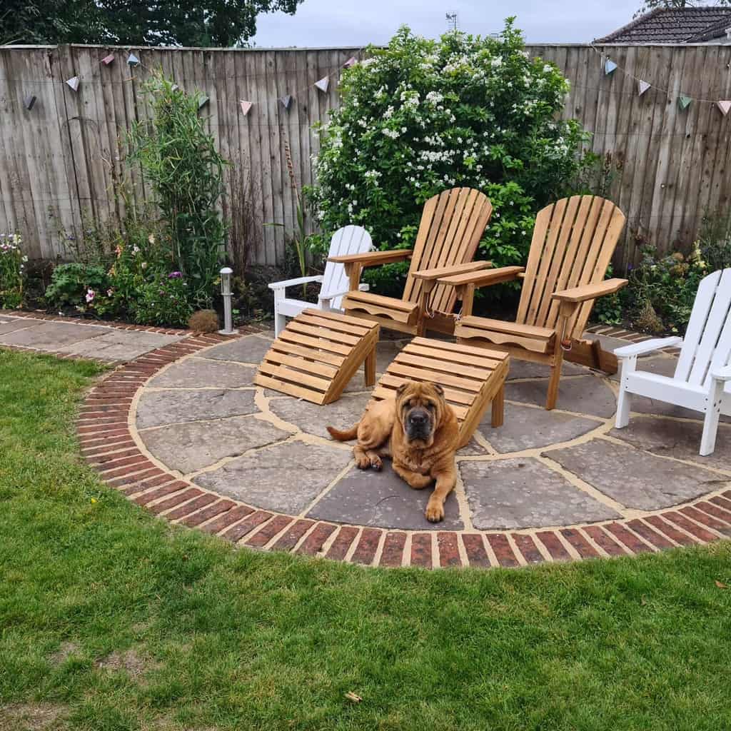 brick garden edging wood outdoor chairs wood fence dog