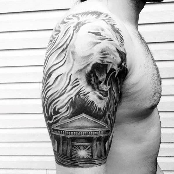Building With Roaring Lion Guys Shoulder And Arm Tattoo
