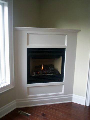 Built In Concrete Fireplace Design With White Mantel