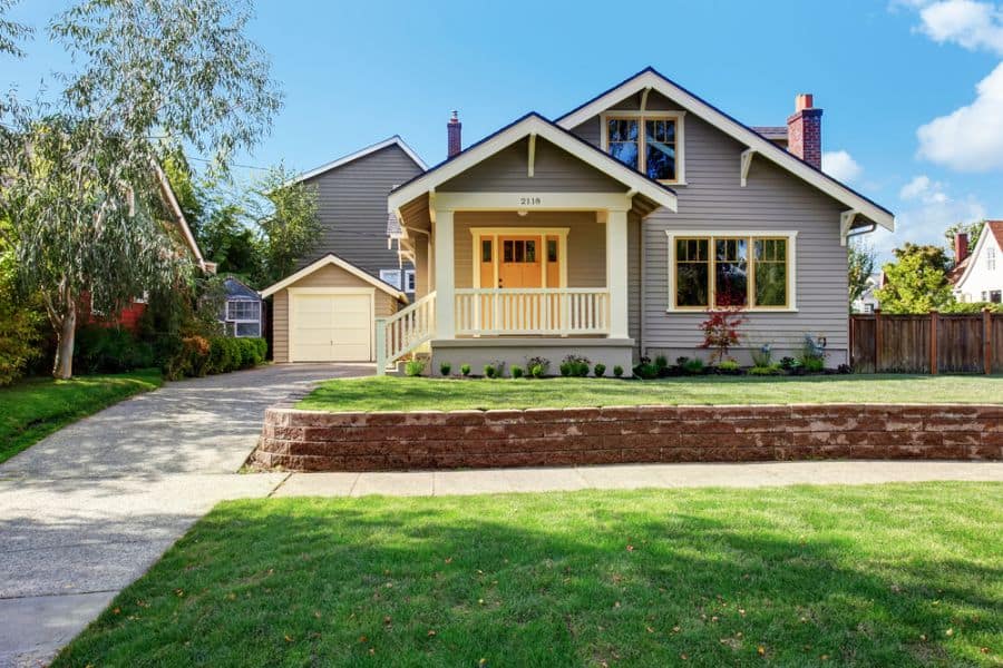 gray bungalow craftsman house style retaining wall