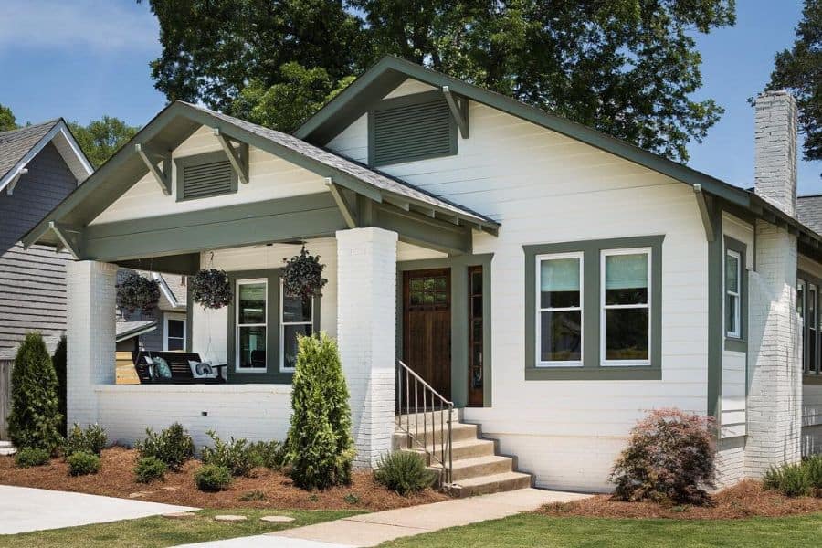 white and green bungalow craftsman style house 