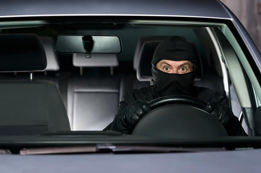 car thief gets trapped in car and panics
