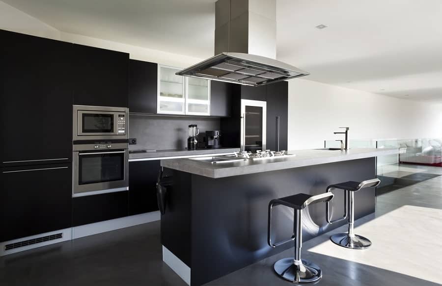 modern luxury kitchen with black cabinets and island 