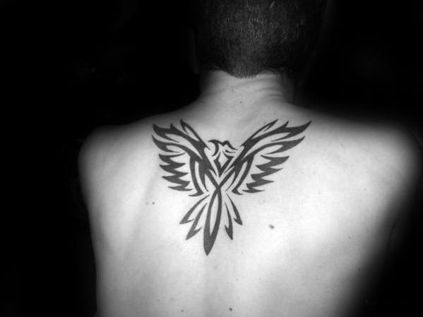 Center Of Upper Back Guys Tribal Bird Phoenix Tattoo Designs