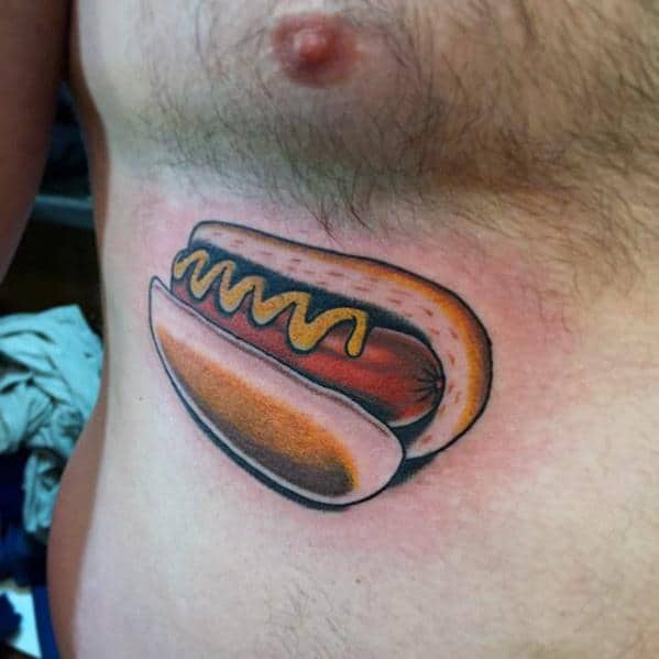 Hot dog tattoo on the inner forearm