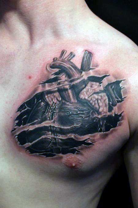 Chest Heart Ripping Through Skin Tattoos For Men