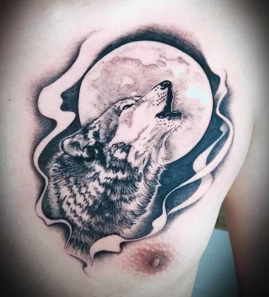 chest howling wolf tattoo thetravellingtattooartist