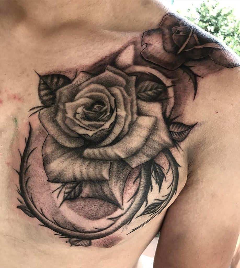 Girls chest rose  vine flower tattoo