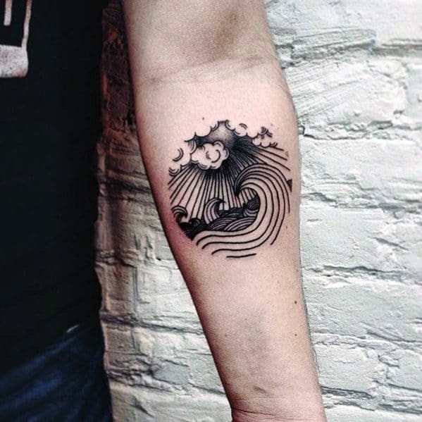 circle-clouds-with-ocean-guys-small-inner-forearm-tattoo