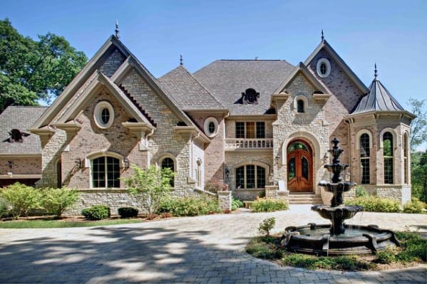 french mansion double story drivway