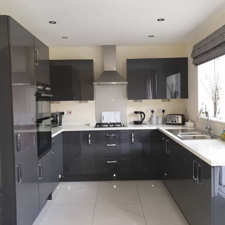 gray cabinet kitchen glossy white floor tiles 