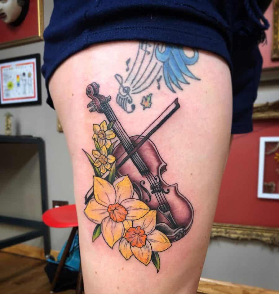 Classic Violin In Brown Surrounded By Yellow Daffodils Unique Tattoo