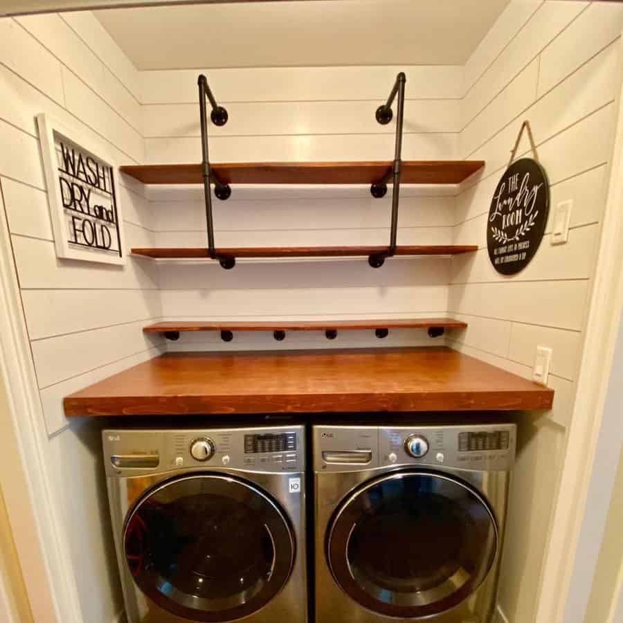 rustic country closet laundry room side by side washer and dryer